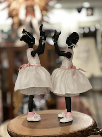 two girls in white dresses